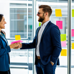 리더십 이론의 실제 적용 사례 - Agile Leadership in Action**

"A diverse team collaborating in a bright, modern co-working space, fu...